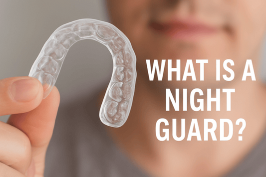 A person holding a night guard