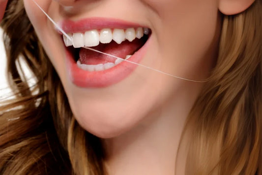 A woman showing off her perfectly straight front teeth