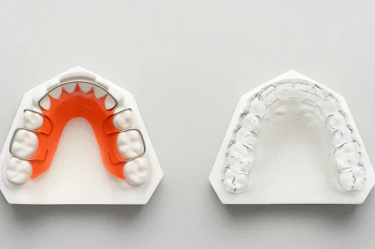 An image of a side-by-side comparison of Metal and Clear Retainers