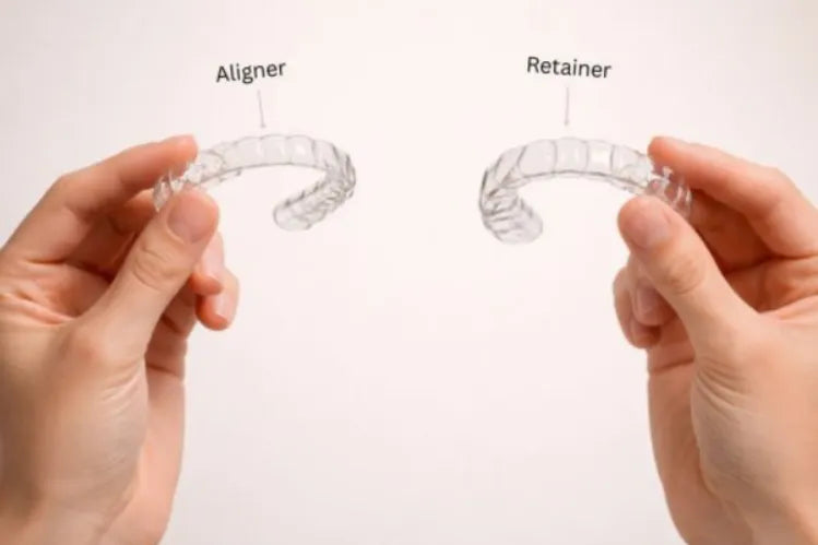 Two hands holding a clear aligner and a thicker retainer